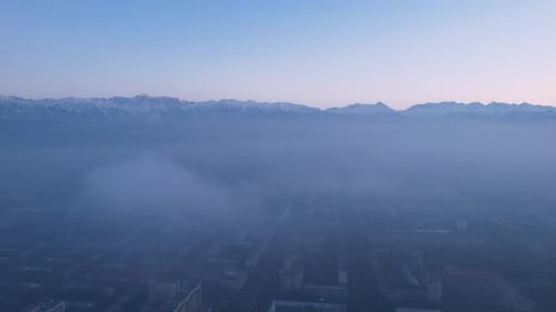 Epic Gray Smog is Visible at Sunset Over the City