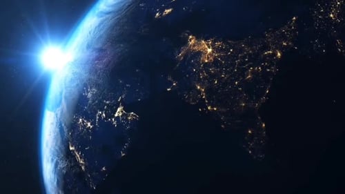 Rotating Planet Earth with Sunrise From Space