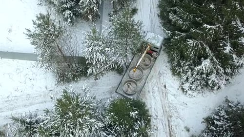 Top view of truck in winter forest