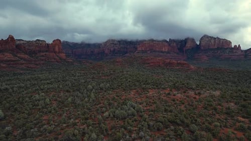 Morning glory Spire panning left in Sedona on a moody cloud cover winter day.
