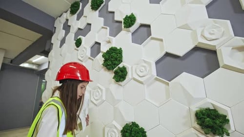 Girl Dressed As Safety Officer Inspecting Project