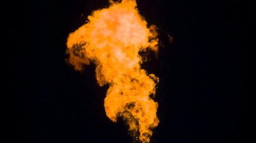 Fiery Plumes Rising Dynamically on Black Background