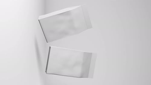 White pouch bags coffee beans branding floating 3D animation loop vertical 4K Merchandise pack promo