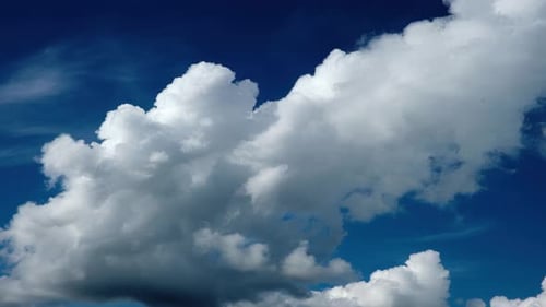 Dramatic Puffy Clouds Against a Vibrant Blue Sky