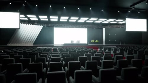 Empty Modern Conference Hall with Red Carpet and Bright Stage Lighting