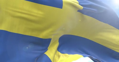 Realistic Waving Swedish Flag in Bright Sky