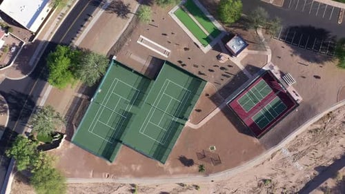 Aerial View of Tennis Courts in a Park