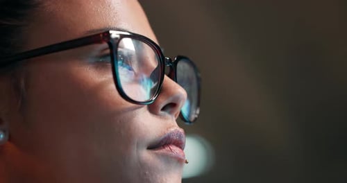 Woman, eyes and coding with glasses for programing, research and development at office