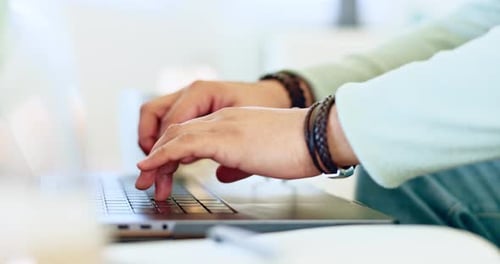 Hands typing, laptop and writing on book, research project and information at desk for remote work