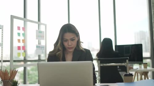 White collar workers are working with team at office.