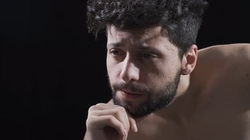 Close-up of thoughtful man.