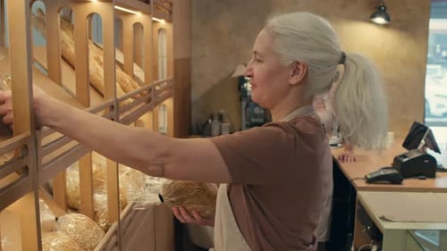 Female Colleagues Working Together at Bakery