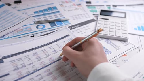 Close Financial Report Check Numbers Accountant Hand with Pen