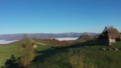 Aerial Drone View of Autumn Countryside Mountain Landscape by Drone. Transylvania, Romania