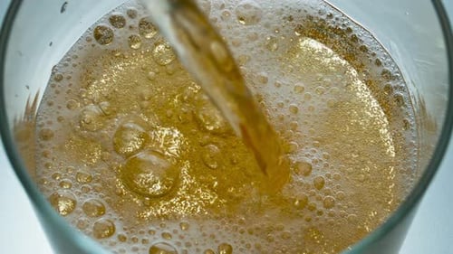 Closeup Craft Beer Filling Glass Slow Motion