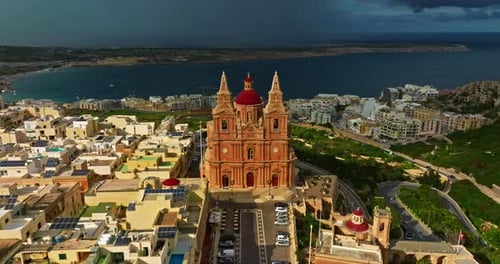 Aerial View of the Mellieha Church with Red Dome and the Sea in the Background Mellieha Malta