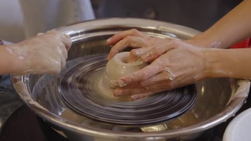Learning Pottery Techniques at a Pottery Studio in a Creative Workshop