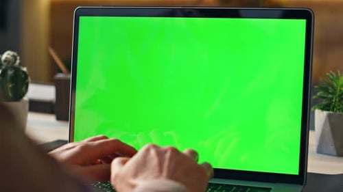 Employee Hands Working Remote on Greenscreen Laptop at Home Workplace Close Up