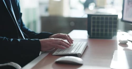 Keyboard, hands and businessman in office with typing for finance report with company budget