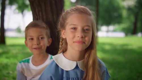 Smiling Children in Park, Close Up Shot