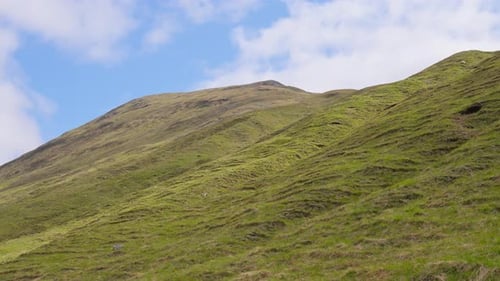 4K High angle parallax of rolling hill countryside of the Scottish Highlands, Scotland