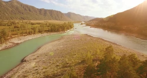 Low Altitude Flight Over Fresh Fast Mountain River with Rocks at Sunny Summer Morning
