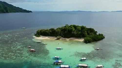 Tropical Philippines island and boats
