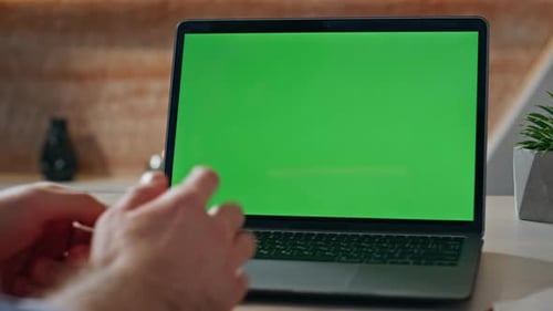 Boss Video Calling Greenscreen Laptop Gesturing Hands at Office Desk Closeup
