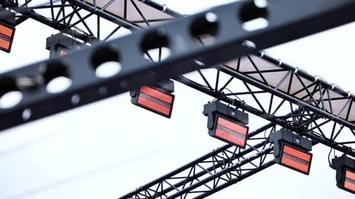 Stage Lighting Truss with LED Spotlights Illuminating Event Production Rigging