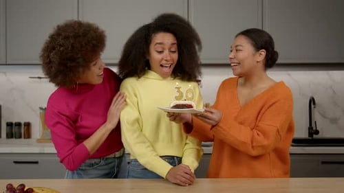 Excited Lovely African American Woman Receiving Birthday Cake with Candles