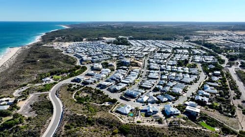 Aerial view of houses along the beach, Australia.