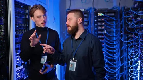 Two Men Working in Server Room