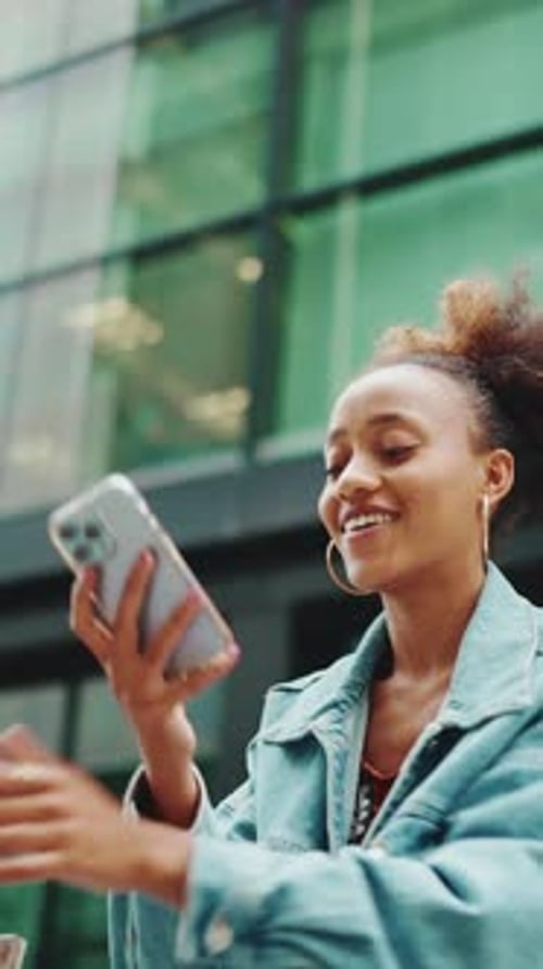 Smiling Woman with Phone in City Portrait