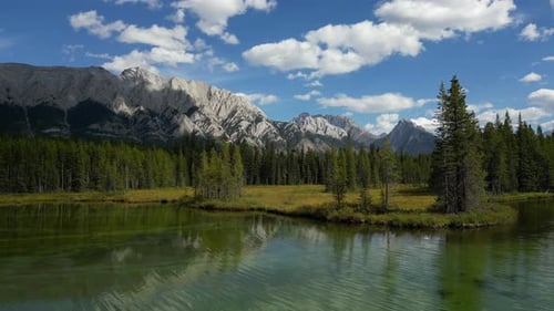 Scenic Mountain Lake View With Pine Trees and Clouds. British Columbia, Canada.