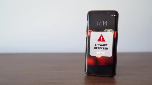 New spyware alert notification on the smart phone. Concept of stealing personal data