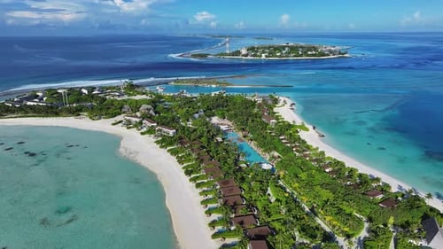 Aerial view of resort Island and ocean, Maldives.