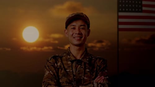 Smiling Soldier in Uniform with American Flag and Sunset