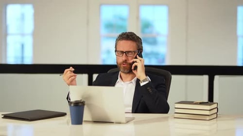 Business Talk Business Man Talking on Phone in Office Business Man Using Smart Phone Business Man