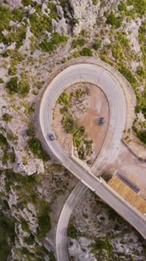 Aerial view of winding road through mountains, Spain.