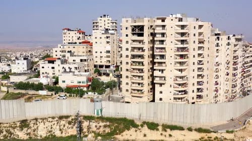 Security wall with Israeli idf watch tower Close to Anata Refugee Camp- Aerial