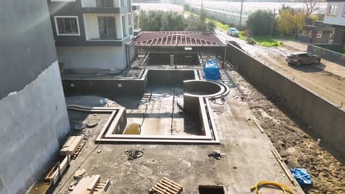 Aerial View of a Swimming Pool Under Construction