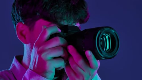 Backstage Photographer in Studio Shooting with Camera