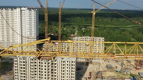Building Crane and Buildings Under Construction