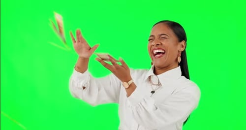 Winner, money and happy with business woman on green screen for success, lottery and bonus