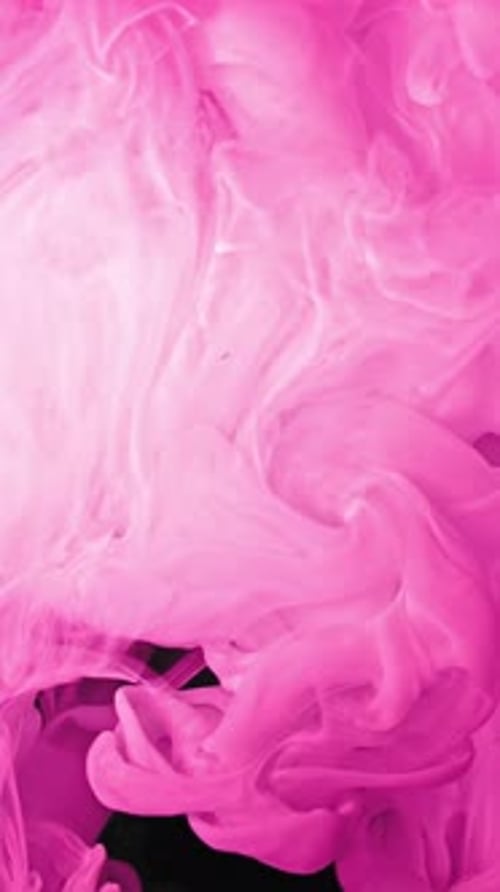 Bright Pink Fluid Spreads Across Black Background