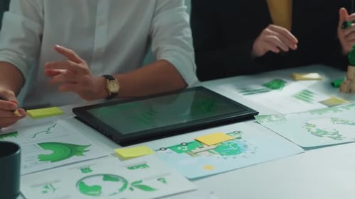 Close up of team hand brainstorming and planning about investment. Alimentation.