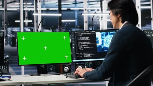 Data Center Programmer Using Green Screen PC Monitor Using AI