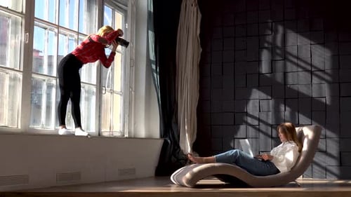 Young Women Working in Bright Creative Studio