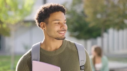 Confident African American College Student Smiling on Campus