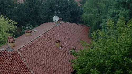 Heavy rain on the roof of a house in Bologna. Italy